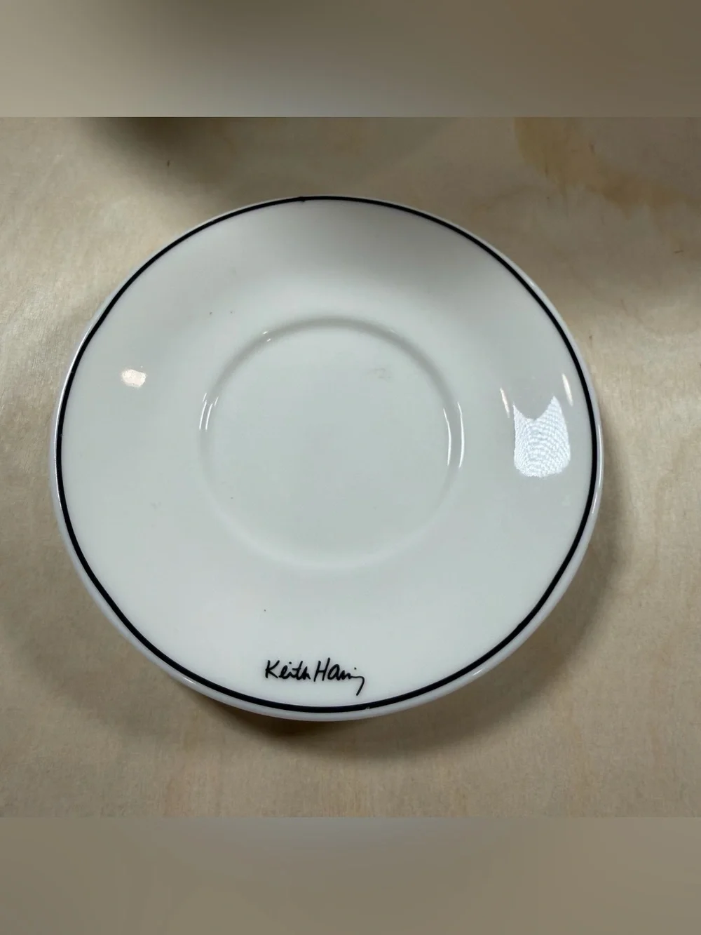 Set Of 2 Keith Haring White Porcelain Coffee Saucers With Black Rim